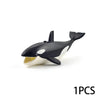 A black and white model of a shark or marine creature used as an ocean animal building block.