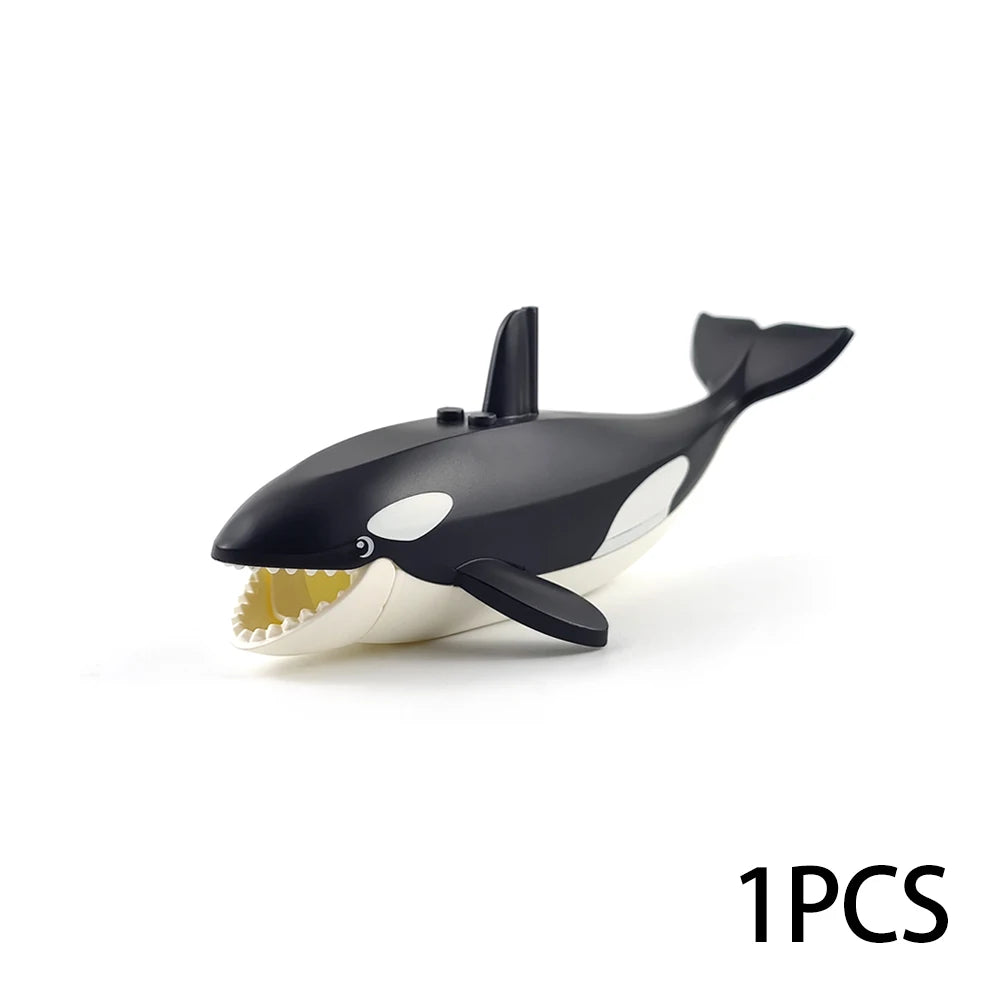 A black and white model of a shark or marine creature used as an ocean animal building block.