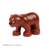 A small, brown plastic building block figure of a bear.