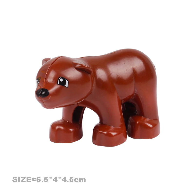 A small, brown plastic building block figure of a bear.
