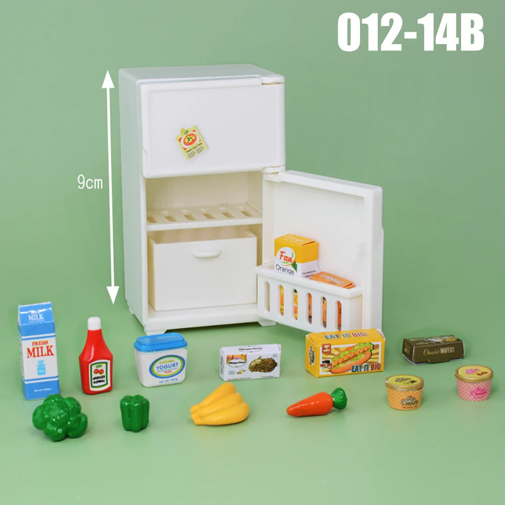 A white dollhouse playset featuring kitchen and living room furniture, including food items like fruit and bread.