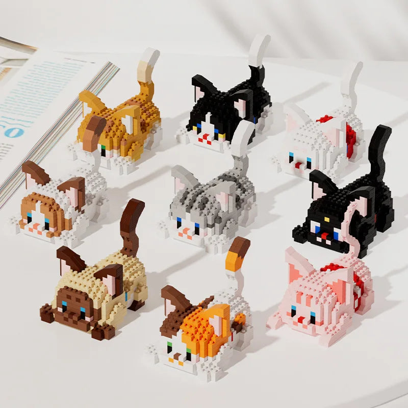 A collection of cat-themed miniature building blocks in various colors and styles.