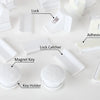 White magnetic cabinet door lock components including a lock, adhesive, magnetic key, and key holder.