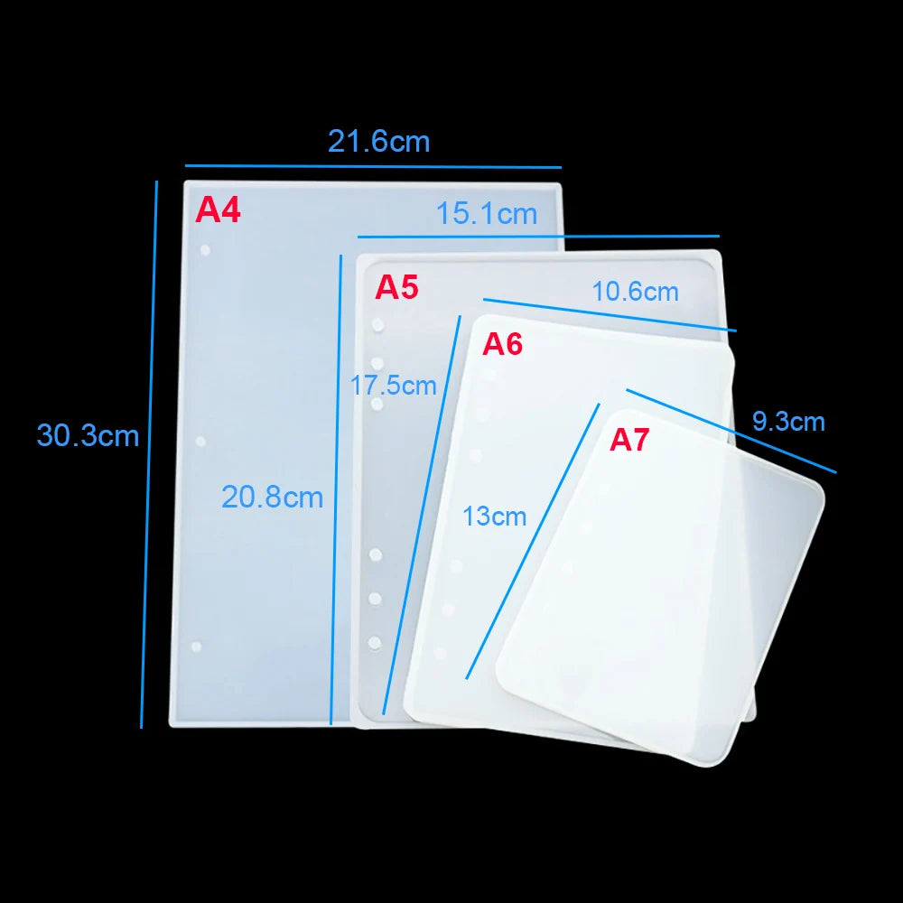 A set of four clear silicone molds for epoxy resin notebook covers, labeled A4 through A7.