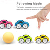 A hand is shown following the direction of gestures or ocean balls, with various colored RC cars and a yellow ball displayed.