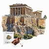 An artistic wooden jigsaw puzzle depicting the Parthenon ruins on a rocky hill.