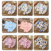 A collection of various patterned cotton pajama sets for boys and girls, featuring floral, animal, and abstract prints.