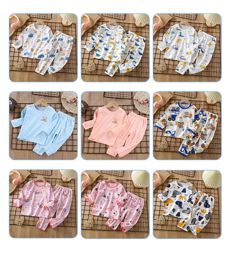 A collection of various patterned cotton pajama sets for boys and girls, featuring floral, animal, and abstract prints.