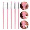 A set of five double-ended silicone dotting pens in pink for nail art, clay, and pottery sculpting