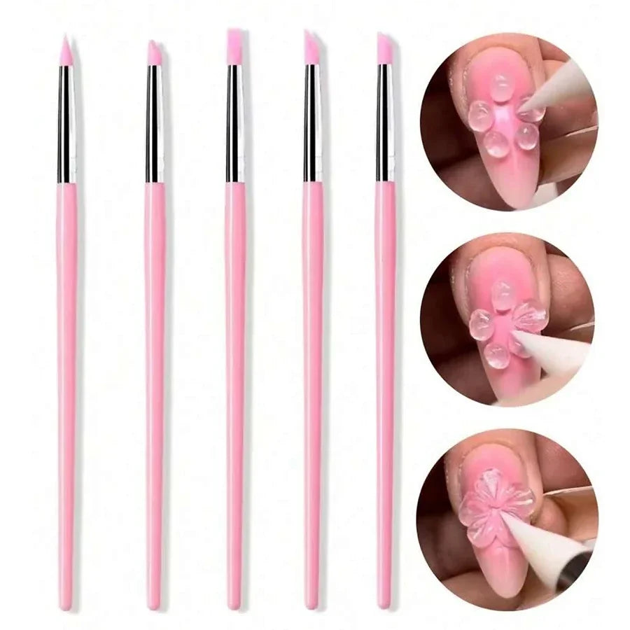 A set of five double-ended silicone dotting pens in pink for nail art, clay, and pottery sculpting
