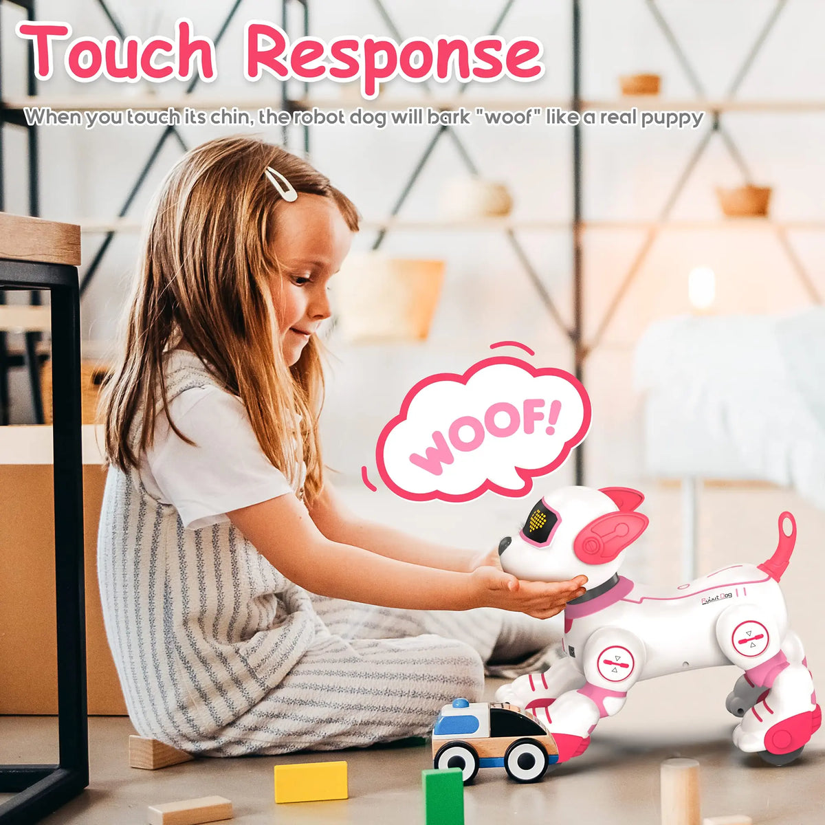 Une jeune fille interagit avec un jouet de chien robot blanc qui fait un 'ouaf'.