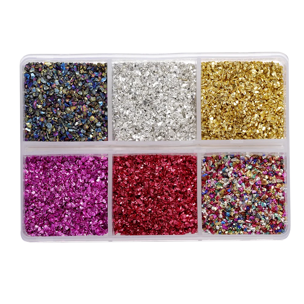 A clear plastic tray filled with various colors of crushed glass stones for resin and craft projects.