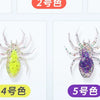 Five colored realistic spider soft bait lures displayed in individual packaging.