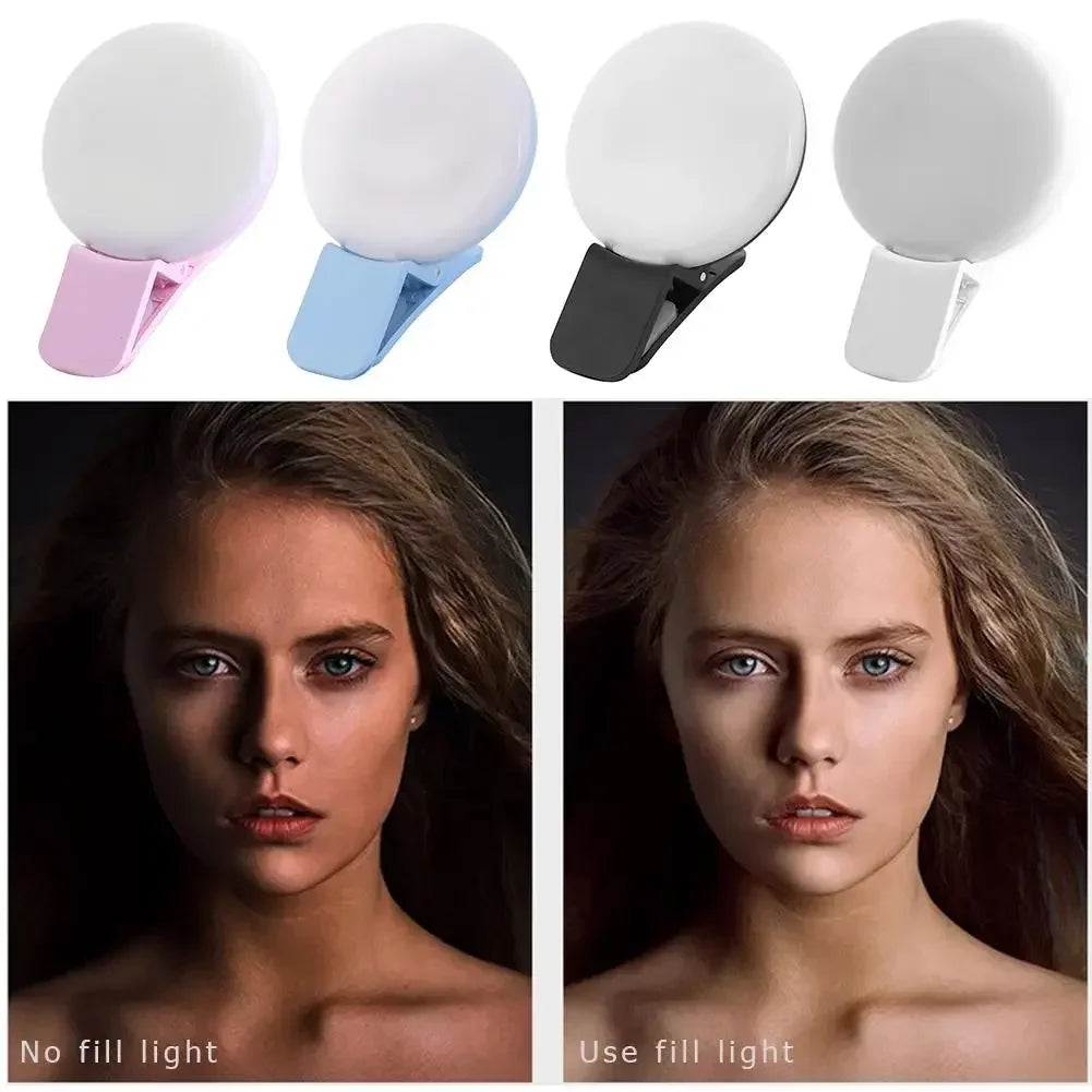 Portable LED selfie ring light in pink and blue colors shown with a model using the full light.
