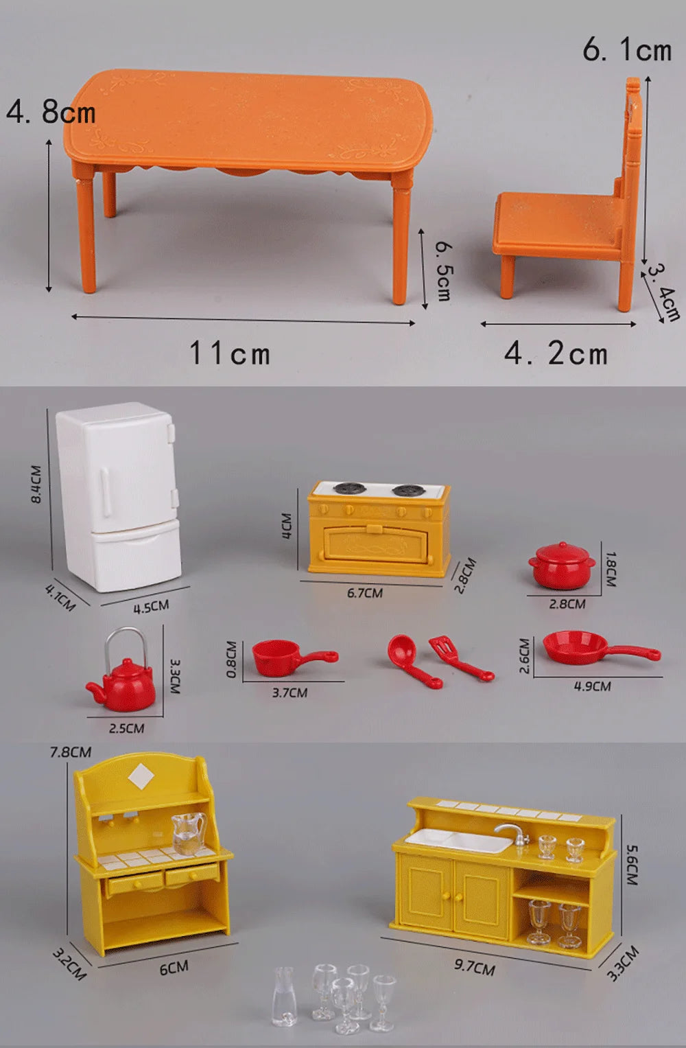 A set of 1:12 scale dollhouse furniture including a table, chair, kitchen appliances, and cabinetry in yellow and orange colo
