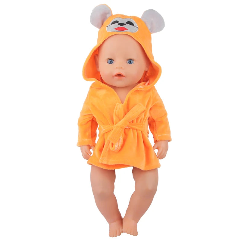 A cute cartoon animal bathrobe and nightgown set for a doll, featuring an orange hooded garment with a face design.