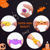 A collection of Halloween squishy stress relief toys including a ghost, cat, and pumpkin shaped mochi squishies.