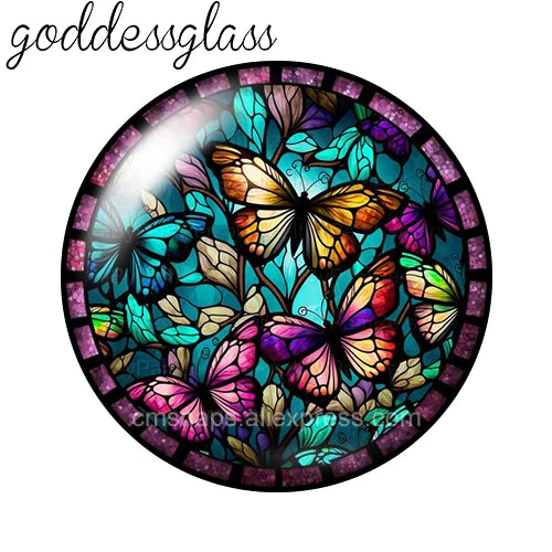 A round glass cabochon featuring colorful butterflies and floral designs for jewelry making.