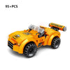 A yellow police helicopter and SWAT carrier vehicle building blocks set with 95 pieces.