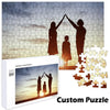 A custom jigsaw puzzle featuring silhouettes of a mother and child against a sunset background.