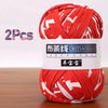 A ball of red and white striped soft chunky yarn, sold as a 2-pack for crochet and knitting.
