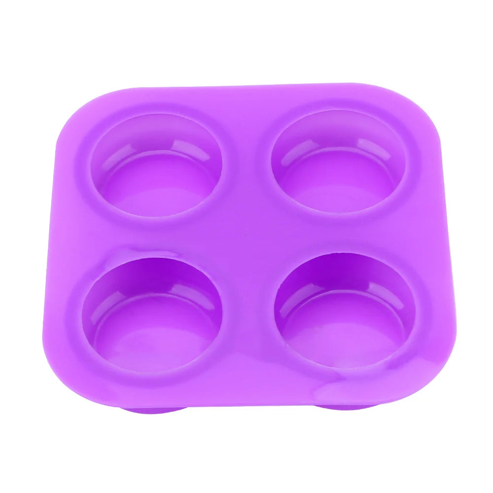 A purple reusable silicone soap mold with four cavities for DIY crafts.