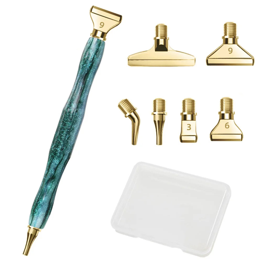 A set of diamond painting pens with interchangeable metal tips and multi-placers, featuring a teal handle and gold tips.