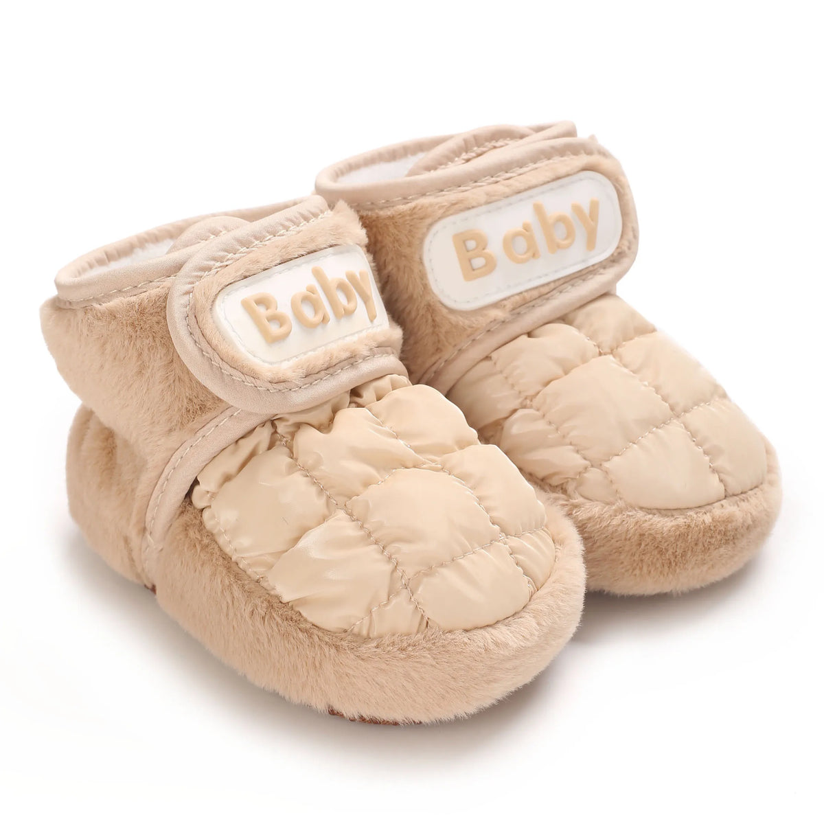 Pair of light beige baby winter cartoon boots with quilted fabric and soft lining