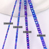 A collection of purple and blue glass rice beads in various sizes and thicknesses for jewelry making