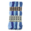 A set of six skeins of vibrant embroidery thread in various shades of blue and teal for cross stitch and DIY crafts