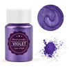 A purple glass jar of pearl powder and a swirl of violet pigment on a white background.