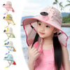 A young girl is holding a pink sun hat with a fan and charging cord, showing various styles of the solar-powered cooling hat.