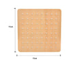 A light wooden peg board with small round pegs arranged in a grid pattern for Montessori activities.