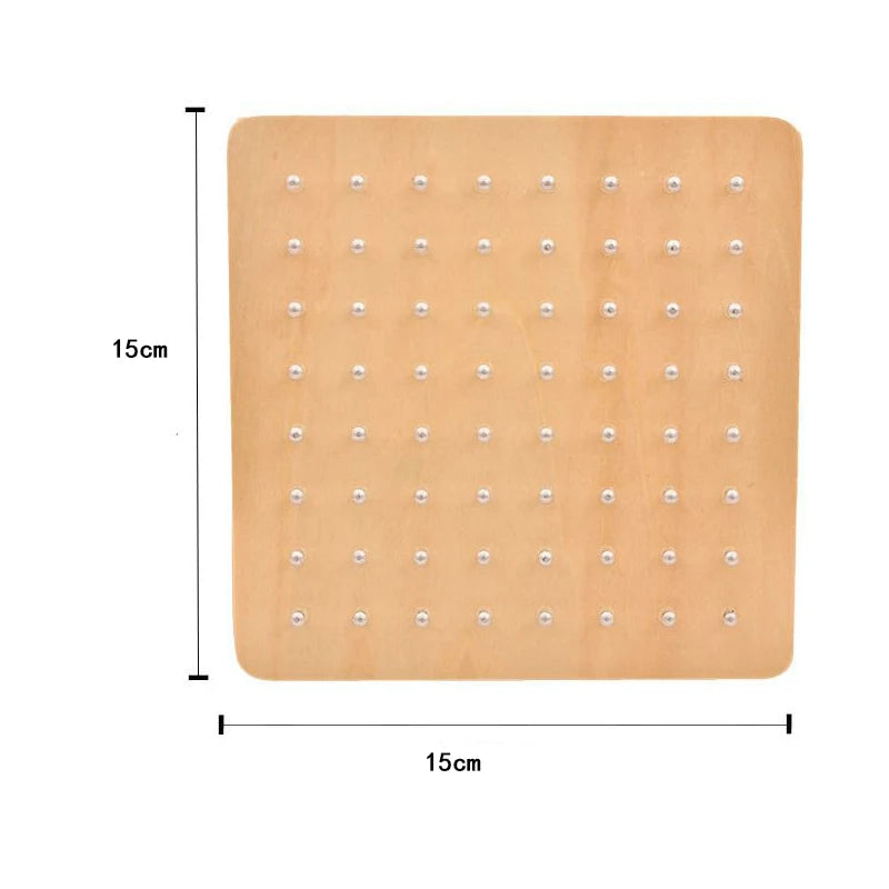 A light wooden peg board with small round pegs arranged in a grid pattern for Montessori activities.