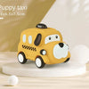 A yellow taxi toy car with black details is displayed on a white circular base.