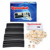 A box and several black tiles of the Classic Rummikub tile strategy game with black racks.