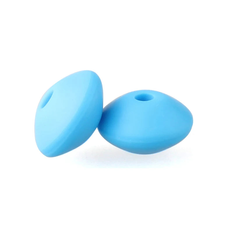 Two light blue silicone lentil beads shaped like an abacus for jewelry making