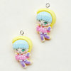 A set of 11 cartoon resin pendant charms featuring a blonde character with light blue hair and pink clothing.