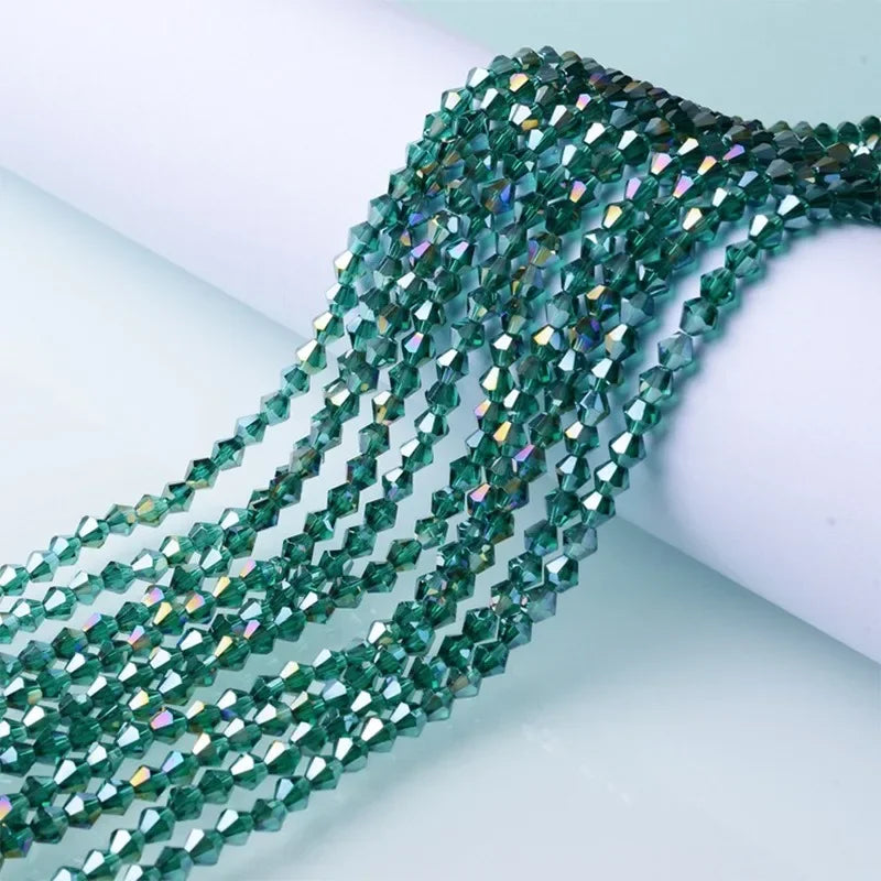 Green faceted glass crystal beads strung together for jewelry making