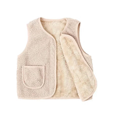 A beige fuzzy lamb wool baby vest with a patch pocket.