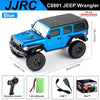 Blue JJRC C8801 Jeep Wrangler RC car with remote control and accessories