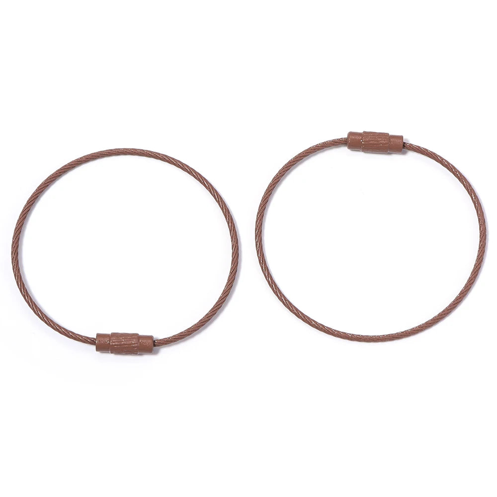 A pair of brown stainless steel wire keychain rings with screw locks.