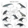 A mini set of 10 realistic ocean animal figurines including a whale, shark, dolphin, turtle, and penguin.