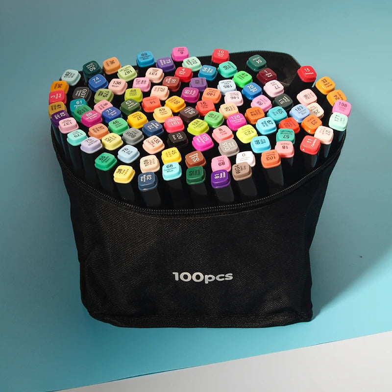 A black pouch filled with numerous alcohol art markers in various colors and tips.