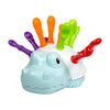 A colorful hedgehog fine motor skills toy with orange and green parts for toddlers.