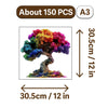 A wooden jigsaw puzzle depicting a colorful tree with vibrant foliage.