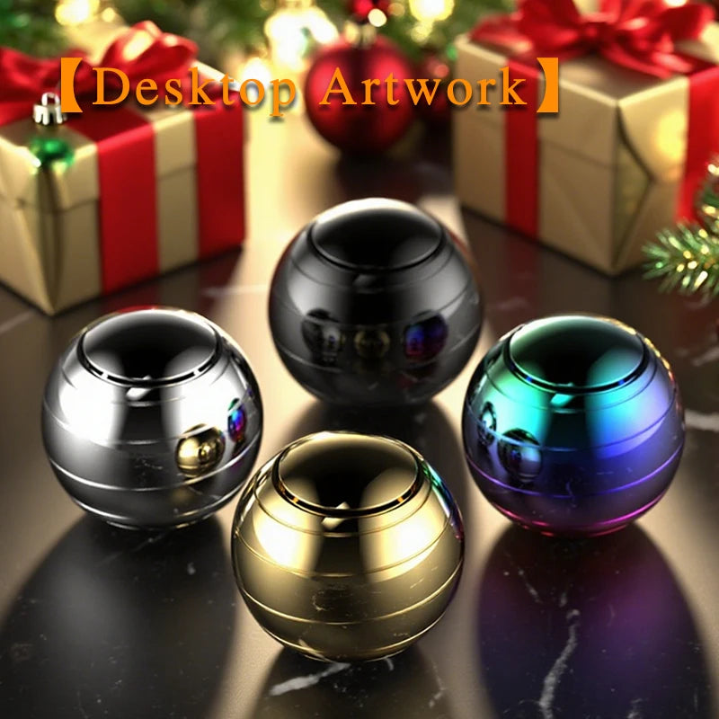 A collection of shiny metal fidget spinners in various colors resting on a dark surface next to wrapped gifts.