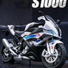 A white and blue 1:12 scale die-cast model motorcycle with front steering displayed against a dark background.