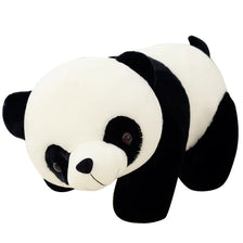 A soft panda plush pillow with black and white markings.