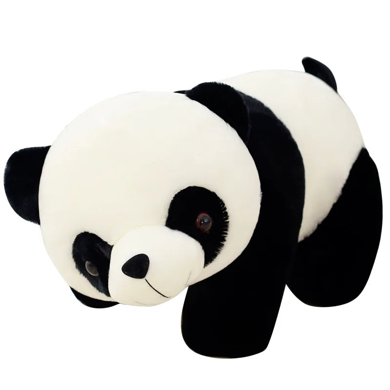 A soft panda plush pillow with black and white markings.
